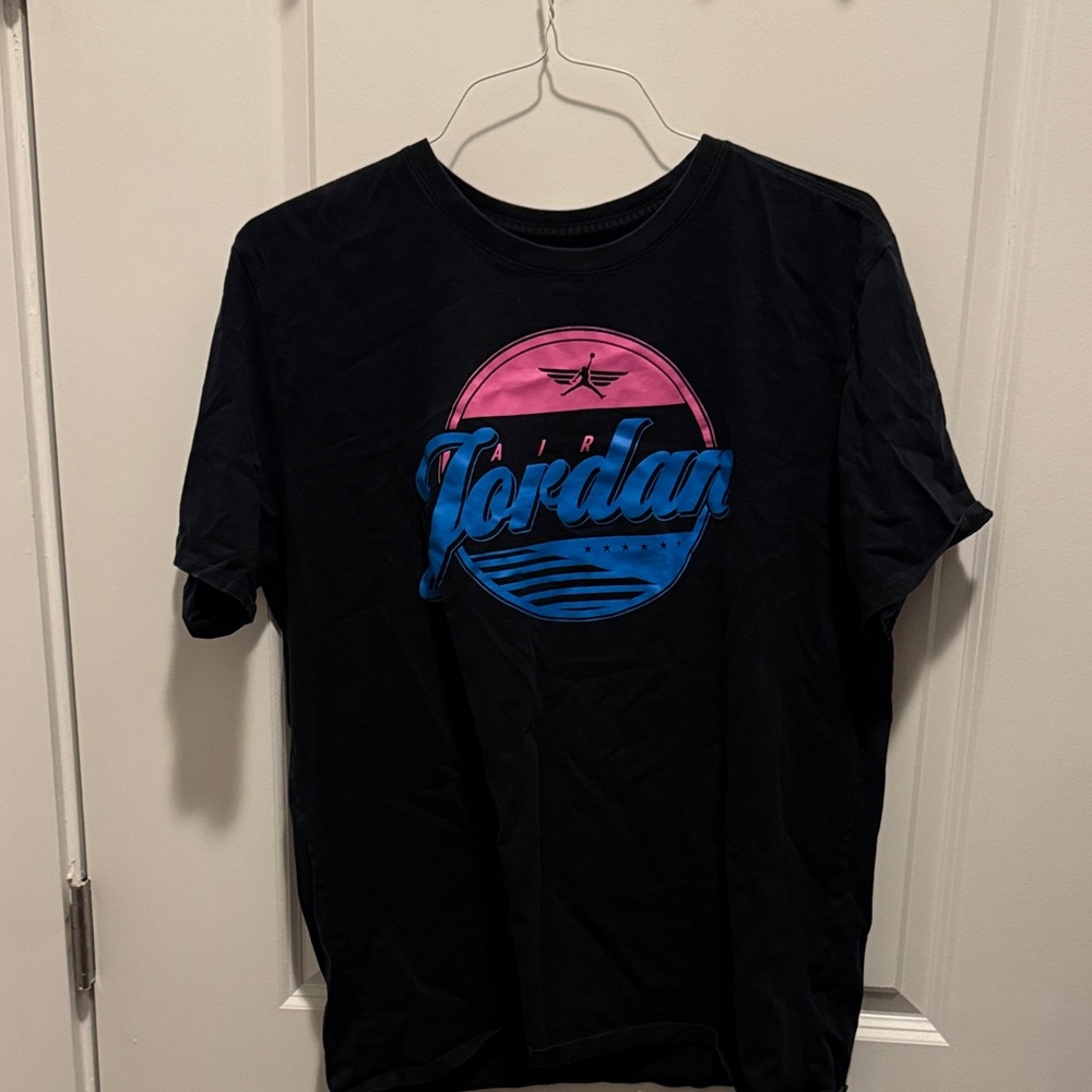 Jordan Black Tee with Vibrant Pink and Blue Logo